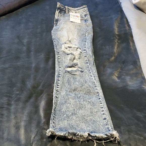 Risen Jeans Denim - Light Blue Women's Distressed Flare Jeans with Raw Hem